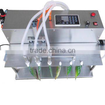 Electric Digital Control 6L Flow Rate 3 Nozzles Spout Bag Filling Machine For Spice Water