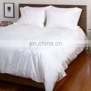 white bedding set with embroidery