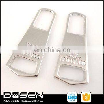 zipper puller with polished sliver color, shiny silver, engraved logo