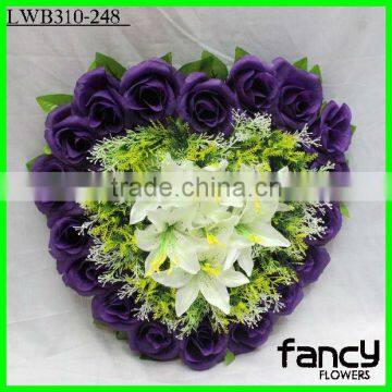 Artificial heart shaped flower arrangement