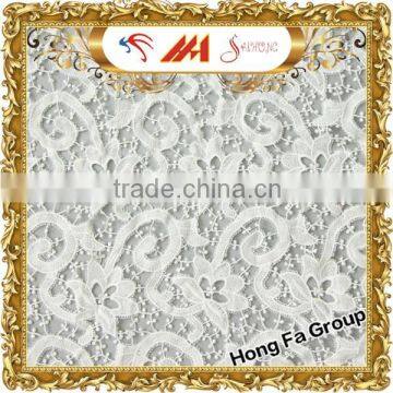 Guangzhou Wholesale solid french guipure lace fabric in fabric for bridal dress