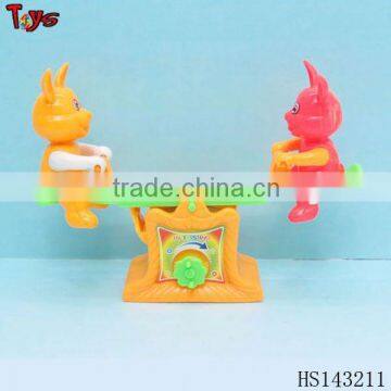 wind up rabit plastic seesaw