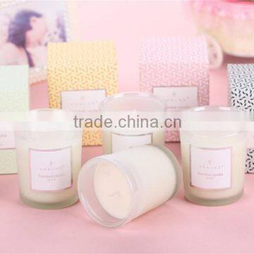 scented soy wax candle in glass jar