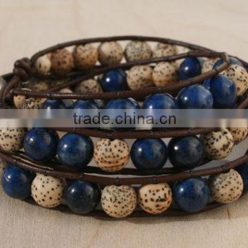 Lapis Lazuli, Sterling Silver, Triple Wrap Leather Beaded Bracelet. Lotus Seed Beads, Sterling Button.