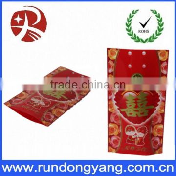 Good quality plastic PE candy bags with red color for wedding favors