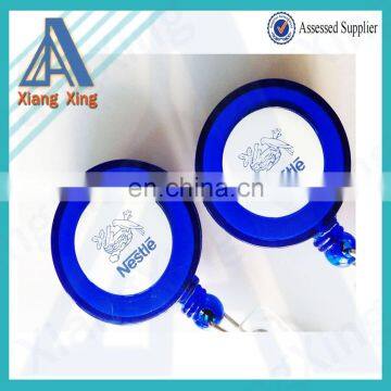 Round plastic logo attached badge with retractable string reels