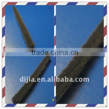 Plastic flexible strip brush with fin for bottom door