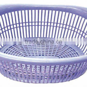 BLUE plastic laundry basket