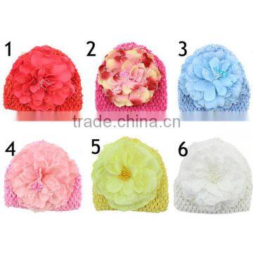baby knitted hat with big pretty flowers