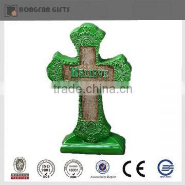 green religious polyresin cross statue