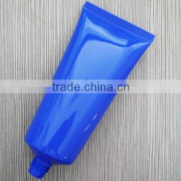 Colored plastic tube for cosmetics packaging