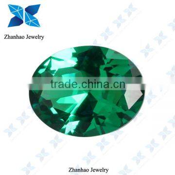 Oval cut green colored rough synthetic spinel stone