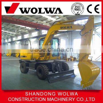 wheel excavator with front dump and back fixed leg