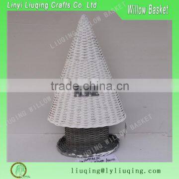 Small white wicker decorated tabletop Christmas tree