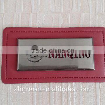 Excellent PU leather label with shiny silver metal logo