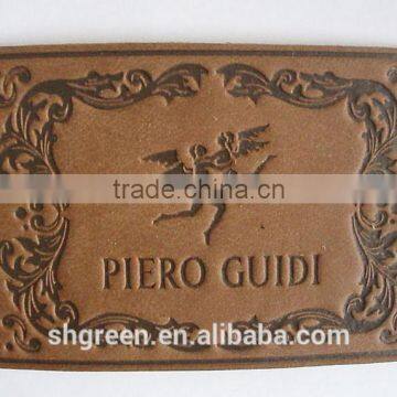 Dark brown debossed brand leather emblem for shoes