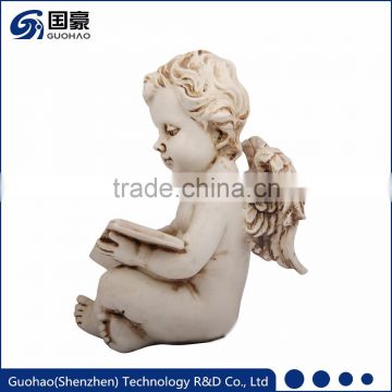 OEM garden decoration reading cherub angel sculpture