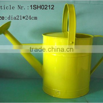 yellow decorative metal watering can