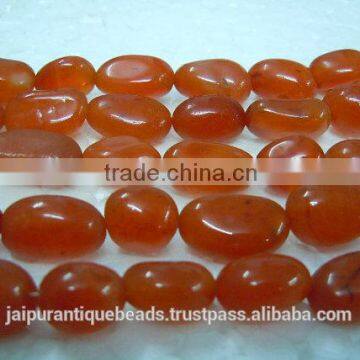 red carnelian smooth nuggets beads