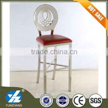 round back high chair with red soft seat