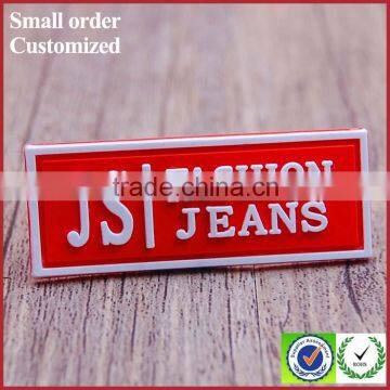 Custom wholesale red pvc labels tags for shirt clothing garment