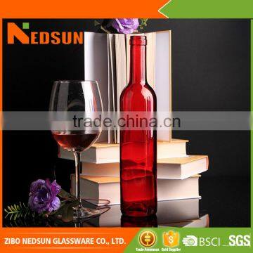 Custimized design glass red colored wine bottles