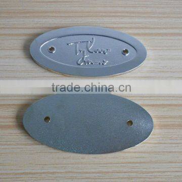 silver tone sand blasting custom oval shape clothing metal logo