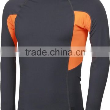 92% Polyester 8% Spandex (Lycra) Crew Neck Long Sleeves Black Compression Shirt / Rash Guard with Orange Side Panels