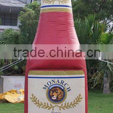 Promotional giant red inflatable wine / beer bottle