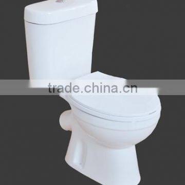 Two piece toilet, X-trap