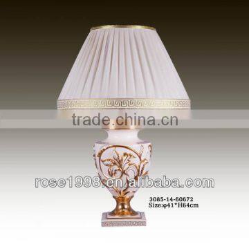 white and gold ceramic lamp table