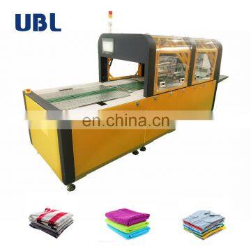 Towel Automatic T-Shirts Folding And Packing Machine t Shirt Silk Screen Printing Machine photo-2