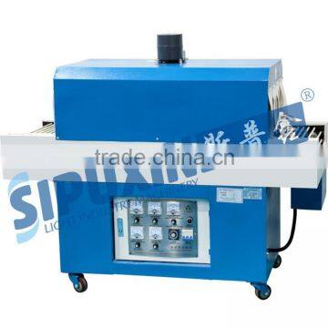 Sipuxin_Semi-automatic infrared ray shrink tunnel for plastic bottle packing wrapping machine