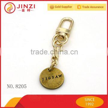 Brass color metal key chain with custom logo