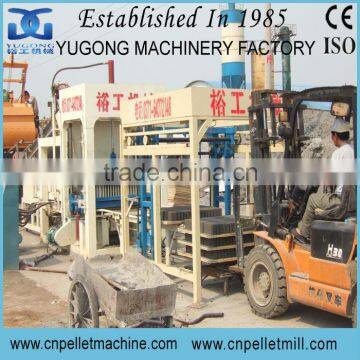 Semi-auto& full auto Yugong QT series hydraulic press concrete brick making machine