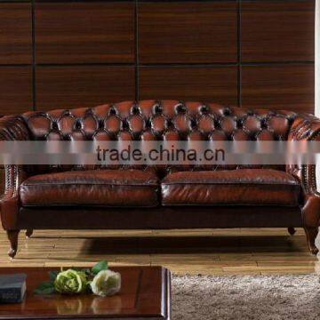 tufted leather sofa on wheels