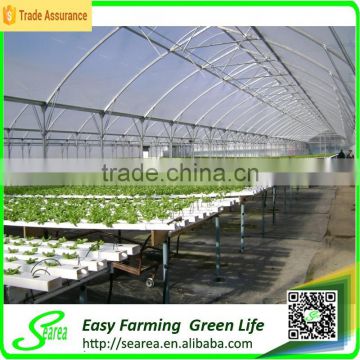 vertical greenhouse growing system for crops