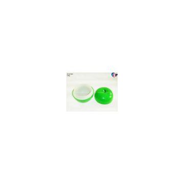 green apple shaped cosmetic jar