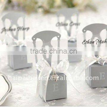 Candy boxes of miniature silver chair favor