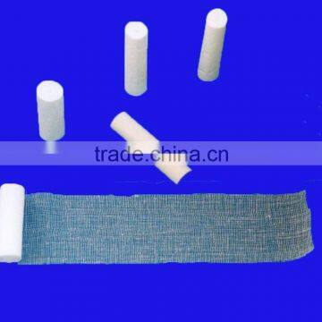 Compressed surgical absorbent medical roll gauze bandage