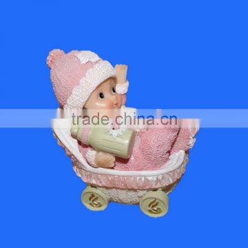 Hot Sale Lovely Baby in Stroller Resin Baby Figurine