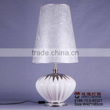 white porcelain and silver shade table lamp