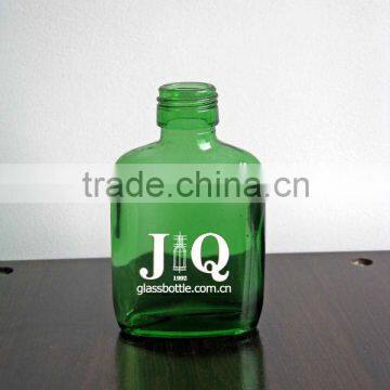 green glass flat bottle for spirit liquor