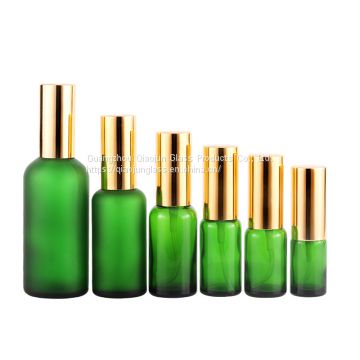 Excellent Quality  Green 10Ml 15Ml Round Hot Stamping Bottle Essential Oil Glass Bottles With Sprayer