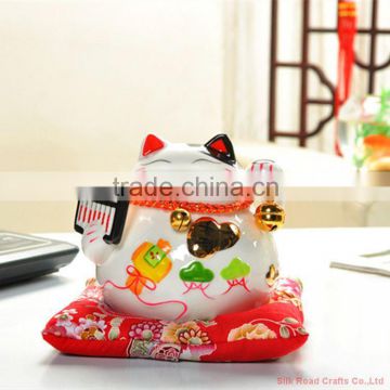 Hot sell cute coin stealing cat money box