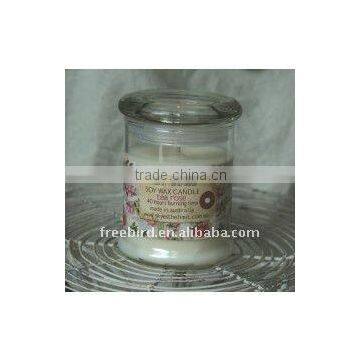 Scented soy candle in glass jar