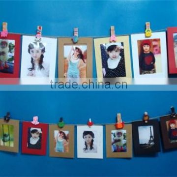 eco-friendly paper picture photo frames hanging over at the wall