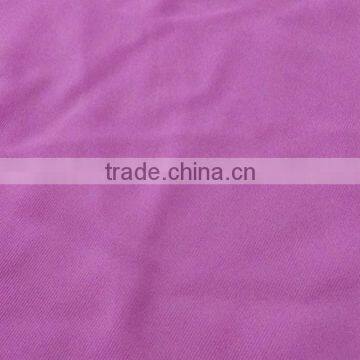 Warp knitted polyester spandex fabrics