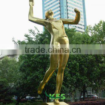 Metal sportswoman standing statue