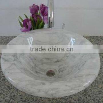 white marble stone bath sinks